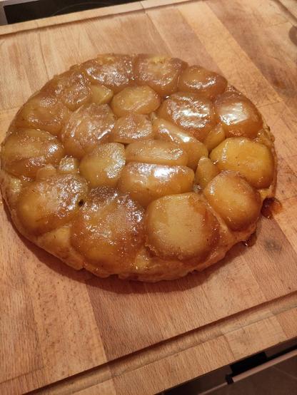 ... And flipped!! It worked!!

The apples tarte was removed from the pan and flipped upside down. Pastry is now the bottom , the apple halves in Carmel sit atop.