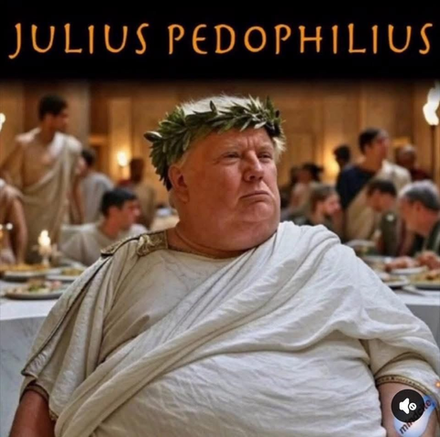 Image of Donald Trump dressed as an overweight Julius Caesar, the former Roman dictator. The image reads, “JULIUS PEDOPHILUS” at the top. The scene is a still from a movie or television show, depicting Trump in a classical Roman setting. He is seated, wearing a white toga and a wreath of green leaves on his head. Trump has a full face and appears to be gazing forward with a serious expression. In the background, a large group of people are seated at a long table, partially obscured, creating a sense of a banquet or meeting. The lighting is warm and appears to be indoor, possibly lit by candles or lamps.
