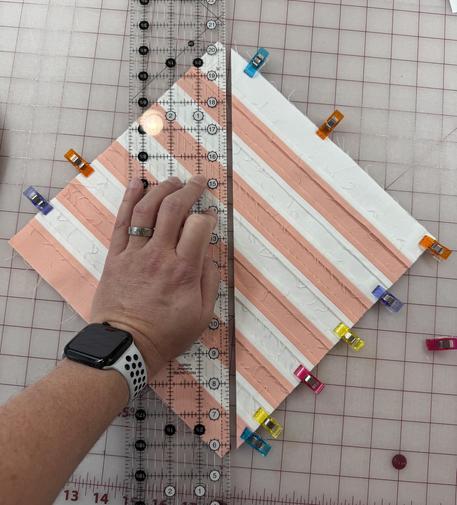 Cut along the diagonal + 1/4”