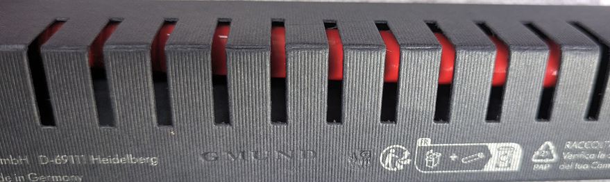 Red Lamy pen in black case.