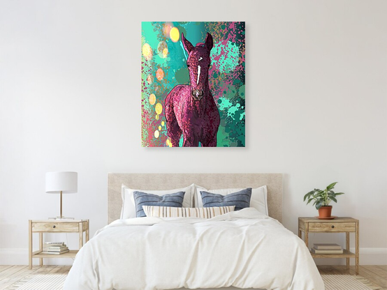 Wall mounted canvas print artwork of - Into The Pinks Splattered Paint Horse Portrait by Joan Stratton - paintingsbyjoan.com in a bedroom scene.
This little fella is born to jump! A splash of springtime energy wrapped in pinks, teals, and playful sparkle. It feels like the first gallop, the first curious glance, the first “what happens if I kick the air just because?”
In many cultures, horses are symbols of freedom, intuition, and the untamed spirit. The foal, especially, carries the energy of new beginnings, a creature born with wind in its heart and curiosity in its hooves.
This piece captures that spark: a vibrant young foal prancing through a dreamscape of colour and light. Its pink coat glows with playful confidence, while the background swirls like a paddock painted by joy itself. It feels like laughter in motion, like the first gallop of spring, like a reminder that wonder is always just one kick away.
Created using my Ether Art technique — hand-drawn digitally from a blank canvas — this piece blends expressive abstraction with storytelling and vibrant rhythm.
Perfect for lovers of whimsical animals, surreal nature, and joyful design. Available across fine art prints, canvases, puzzles, apparel, and home décor.
Explore more expressive equine outlines and country-inspired moments in my gallery at;
https://joan-stratton.pixels.com/collections/horses
