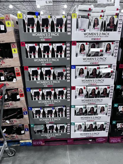 Picture of merchandise on Costco shelves with extra large at the bottom and small at the top