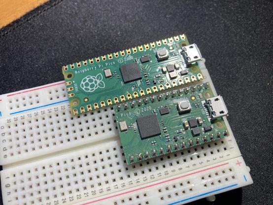 Two Pi Pico boards, one that was cut down in size.