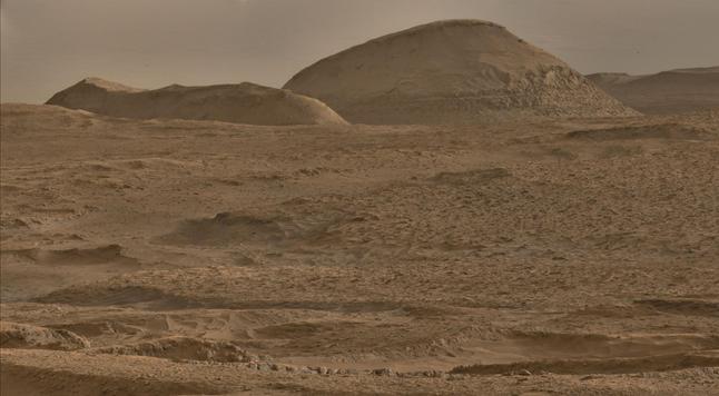 An ochre toned photography of a Martian landscape.
