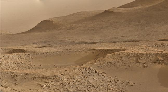 An ochre toned photography of a Martian landscape.