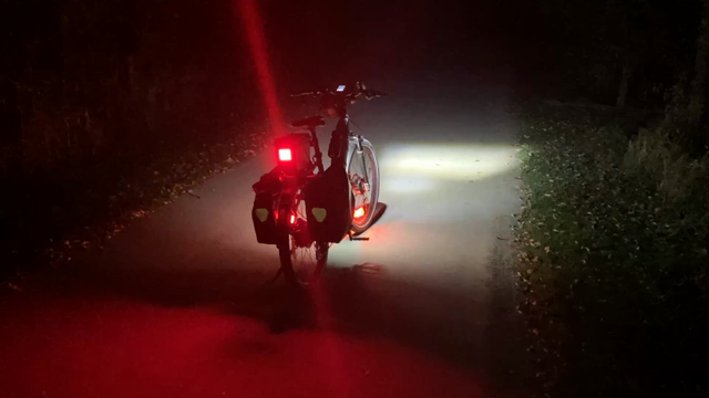 A video of a bike with lights on it.