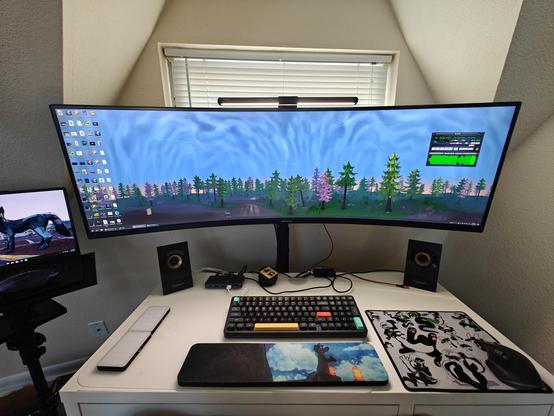 a 32:9 monitor.  It's big enough it could probably hug me
