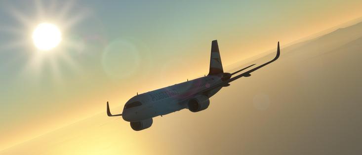 The image depicts an airplane in flight against a backdrop of a gradient sky, transitioning from a light blue at the top to a warm orange near the horizon. The sun is positioned in the upper left corner, casting a bright light and creating lens flares and a soft glow across the sky. The airplane is a commercial jet, specifically an Austrian Airlines aircraft, as indicated by the logo and text on the fuselage. The aircraft is captured in a side profile, with its nose pointing towards the left side of the image. The tail of the plane features a distinctive design with a red and white color scheme. The overall scene conveys a sense of travel and adventure, with the airplane soaring through a serene and picturesque sky.