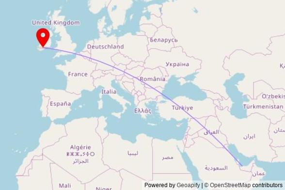 A map showing the great circle route from Al Dhannah in the United Arab Emirates to a map pin at Dromahane Church, R619, County Cork, Ireland