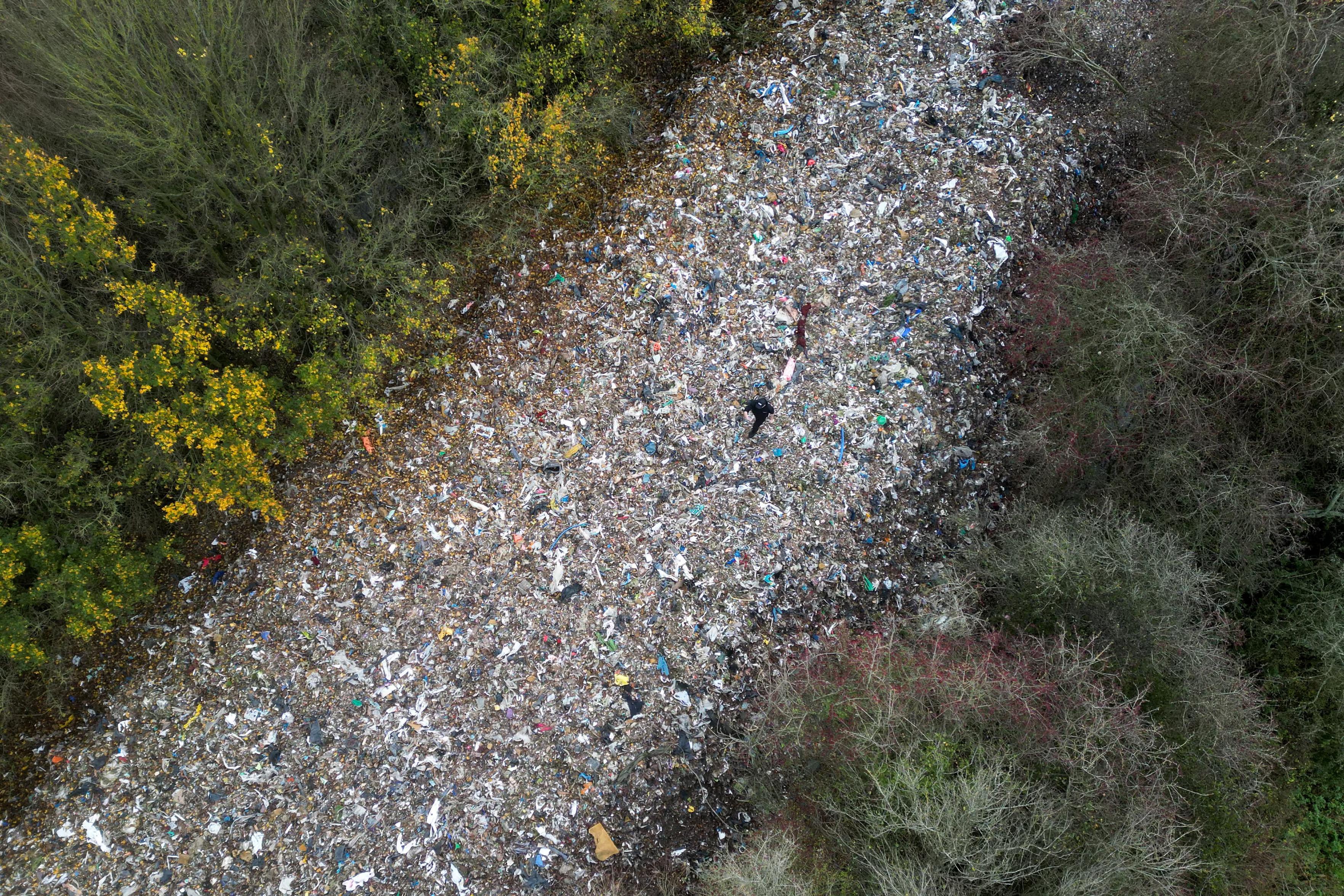 A large pile of fly-tipped waste dumped in a field between the River Cherwell and the A34 road.
Photograph: Justin Tallis/AFP/Getty Images