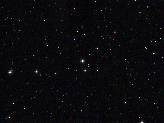 NGC 6543 The Cat's Eye Nebula - unprocessed image. Like the Cat's Eye star, the Sun will become a Red Giant in ~5 billion years, puffing off its outer layers to form a new planetary nebula.