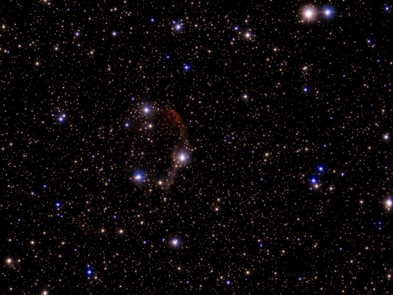 NGC 6888 The Crescent Nebula - telescope processed image. The Crescent Nebula (NGC 6888) is a huge emission nebula in Cygnus. Its shape is carved by the fierce wind of the central Wolf-Rayet star, WR 136.