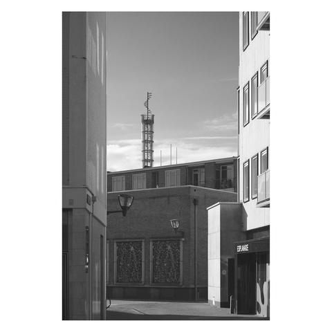 black and white image of a small street in Enschede
