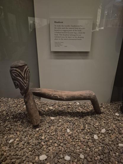 #Headrest

To make the wooden headrest below. the artist used the natural form of a mee brauch to suggest parts of the body A forked branch became legs, a knot the head. This headrest belonged to an initiated man; he kept it at his sleeping place in the men's ceremonial house

Papua New Gu