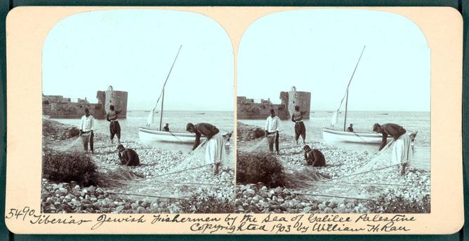 Fishermen work on their nets by the seashore. Their small sailboat is in the water close by, and there is an old fort in the distance. Library of Congress: LC-DIG-ppmsca-10676.