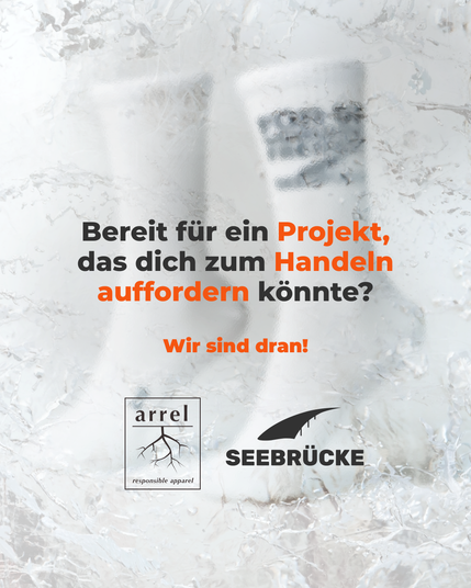 Unscharfes Bild. Auf dem Bild steht “Bereit für ein Projekt, das dich zum Handeln auffordern könnte? Wir sind dran!”. Darunter sind die Logos von arrel und Seebrücke.