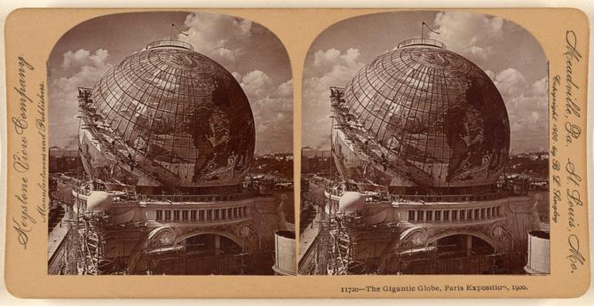 Stereograph of the Globe Céleste, an enormous globe 45 meters in diameter that is decorated with the constellations and signs of the zodiac. The globe rests on masonry pillars. A terrace for spectators is on the top of the globe.