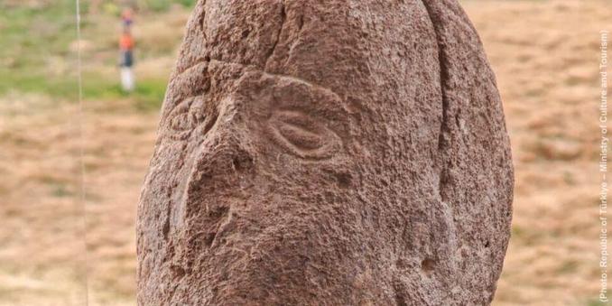 Close-up of the stone sculpture's eyes.