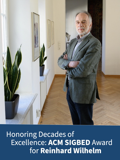 Professor Reinhard Wilhelm stands with his arms crossed in a bright hallway lined with framed artwork and potted plants. He is wearing a gray blazer and light shirt. Below the photo, a blue banner contains the text: “Honoring Decades of Excellence: ACM SIGBED Award for Reinhard Wilhelm.