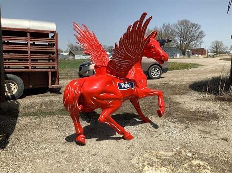 Three-quarter rear view of the same Pegasus sculpture
