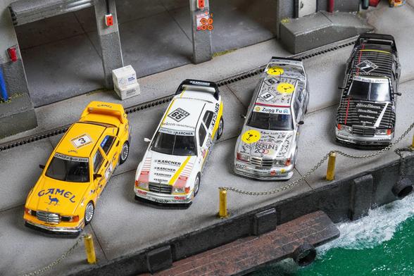 Four cars of Mercedes Benz 190E 2.5-1.6 Evolution II in 1:64 scale on AREA 164.