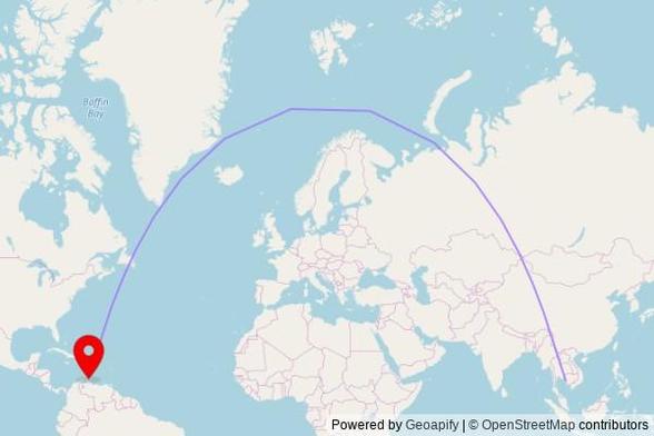 A map showing the great circle route from Khemara Phoumin Municipality in Cambodia to a map pin at Holy Cross Anglican Church, Weg Sero Preto 31, San Nicolaas, Aruba