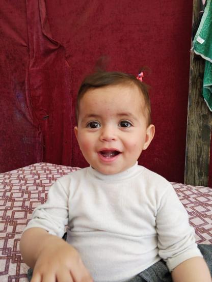 My one-year-old daughter has very little clothing and needs warm winter clothes to protect her from the cold.