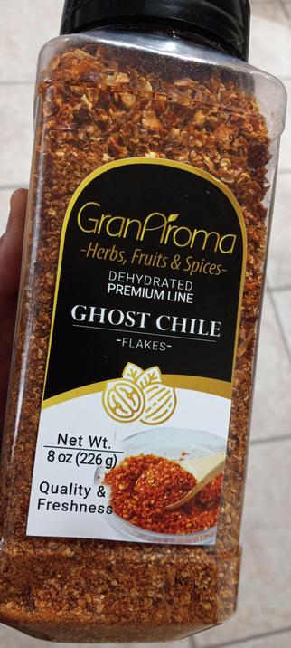 A big 8 ounce container of GranAroma brand Ghost Chile flakes.