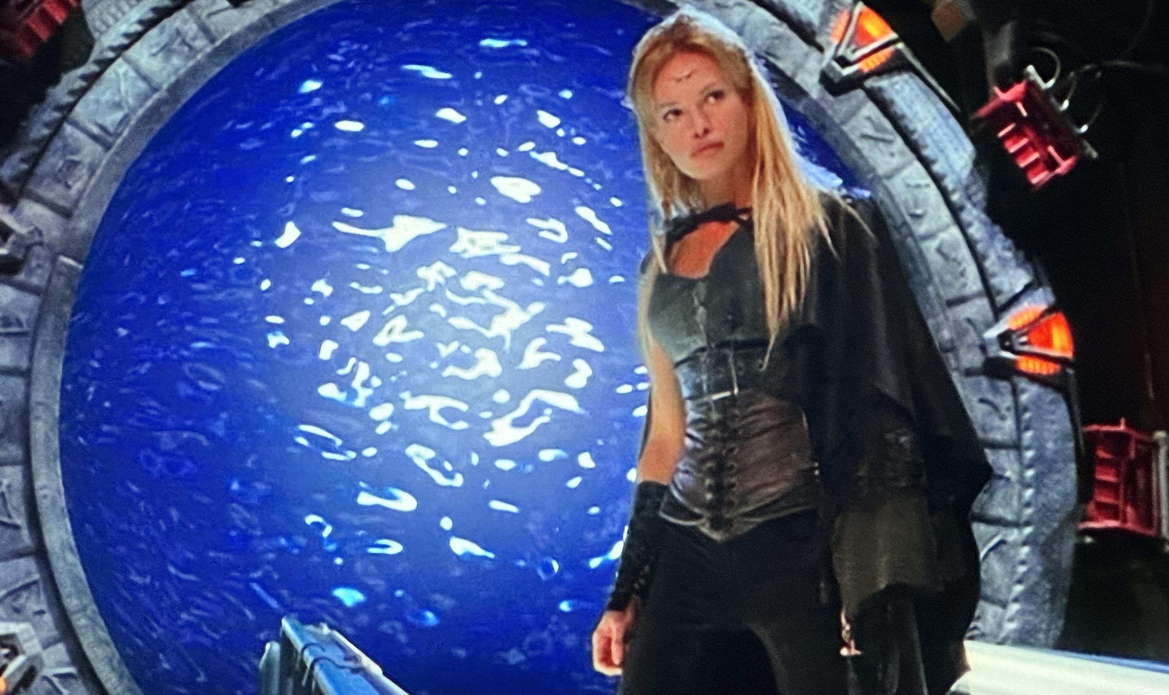 Ishta stands in front of the Stargate