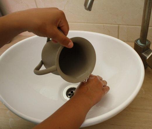 Hands of a person performing Jewish ritual handwashing at a sink. Source: https://pxhere.com/en/photo/709805 CC0 Public Domain: Free for personal and commercial use