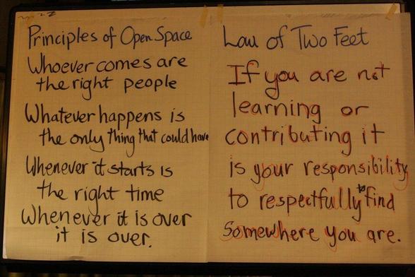 A photograph of the principles and Law of Two Feet of Open Space, handwritten on a piece of brown paper. Photo attribution: Flickr user arvindgrover