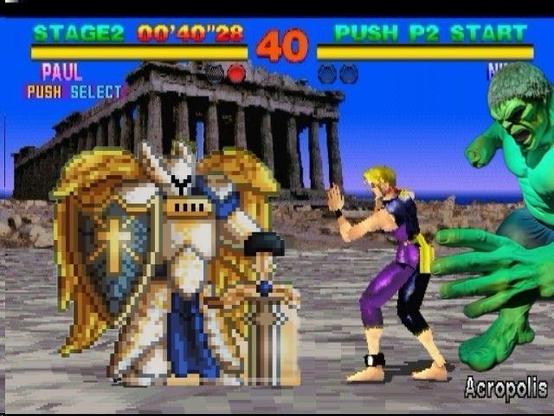 A retro-style video game screen featuring two characters in a fighting scene. One character is an armored angelic figure, while the other is a blonde fighter in purple pants. The background displays the Acropolis, with the game's timer and controls visible at the