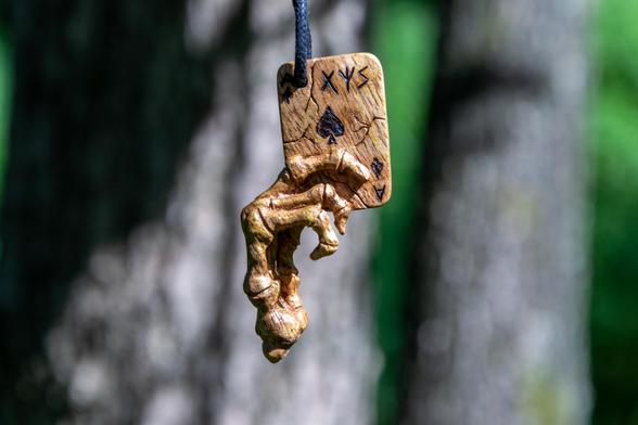 Runes and meranti wood
