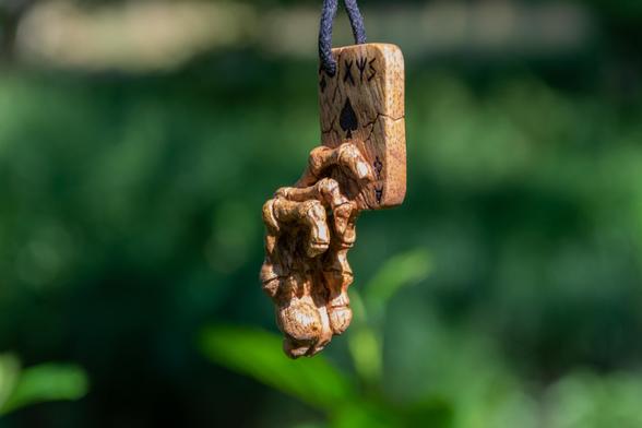 Runes and meranti wood
