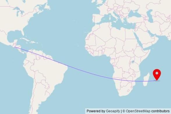 A map showing the great circle route from Cuilapa in Guatemala to a map pin at Seven Days Adventist, Royal Road, Rivière du Rempart VCA, Mauritius