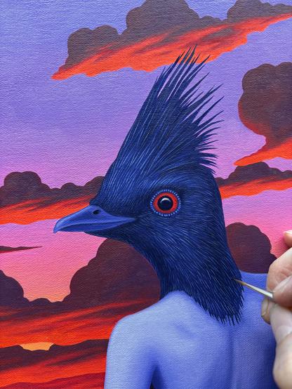An oil painting in progress of a female figure seen from the back. Her head is that of a phainopepla bird, which looks over her shoulder at the viewer. Sunset clouds are behind her.