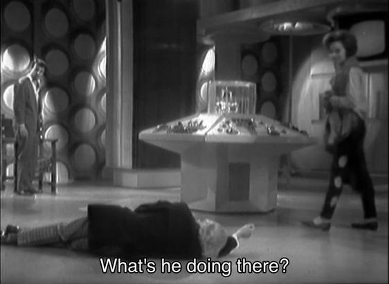 William Hartnell episode. Ian Chesterton, Barbara Wright and the Doctor are in the TARDIS console room. Ian is wearing his trademark cardigan, Barbara has a shirt with a shawl and pants with circular holes going down the side, very chic. The Doctor is lying on the floor, on his side, arm shooting forward uncomfortably. Both of them are looking at him. Caption reads, “What’s he doing there?” Idk, being unconscious?
