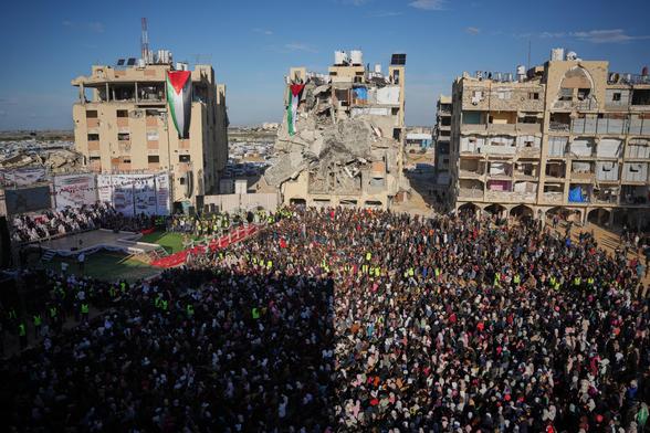A huge crowd gather in Hamad City in Khan Younis to watch the ceremony.