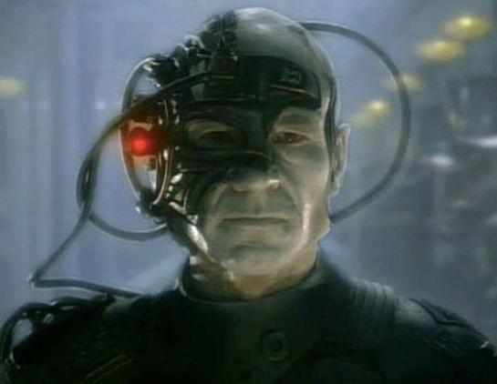 What's better than people augmented by technology at meetings? Imasge of Jean-Luc Picard as Locutus of Borg.
