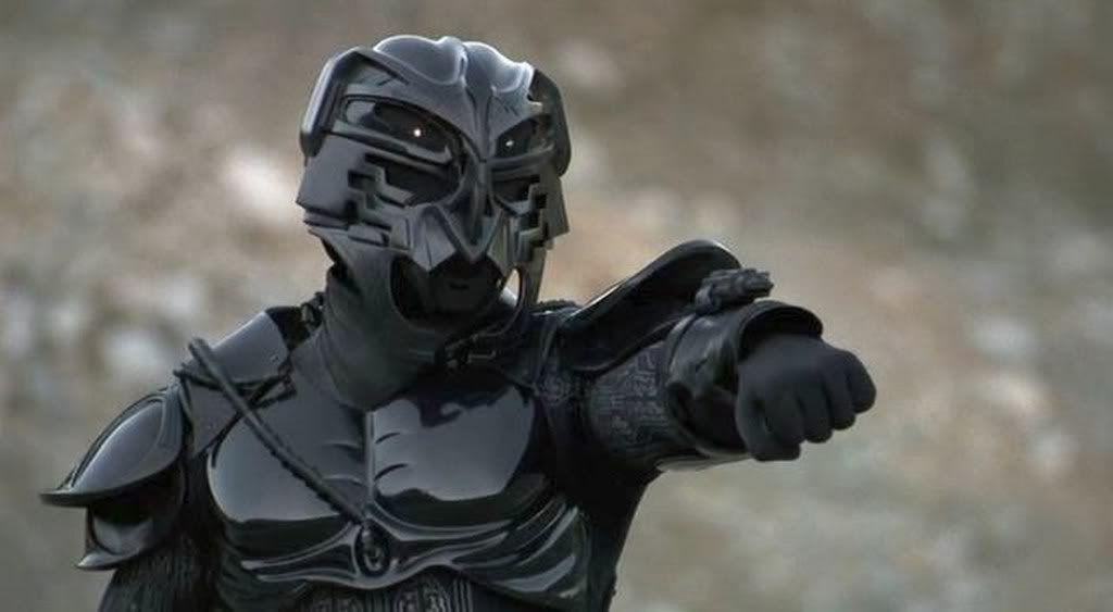 A dark futuristic soldier aims a weapon into the distance