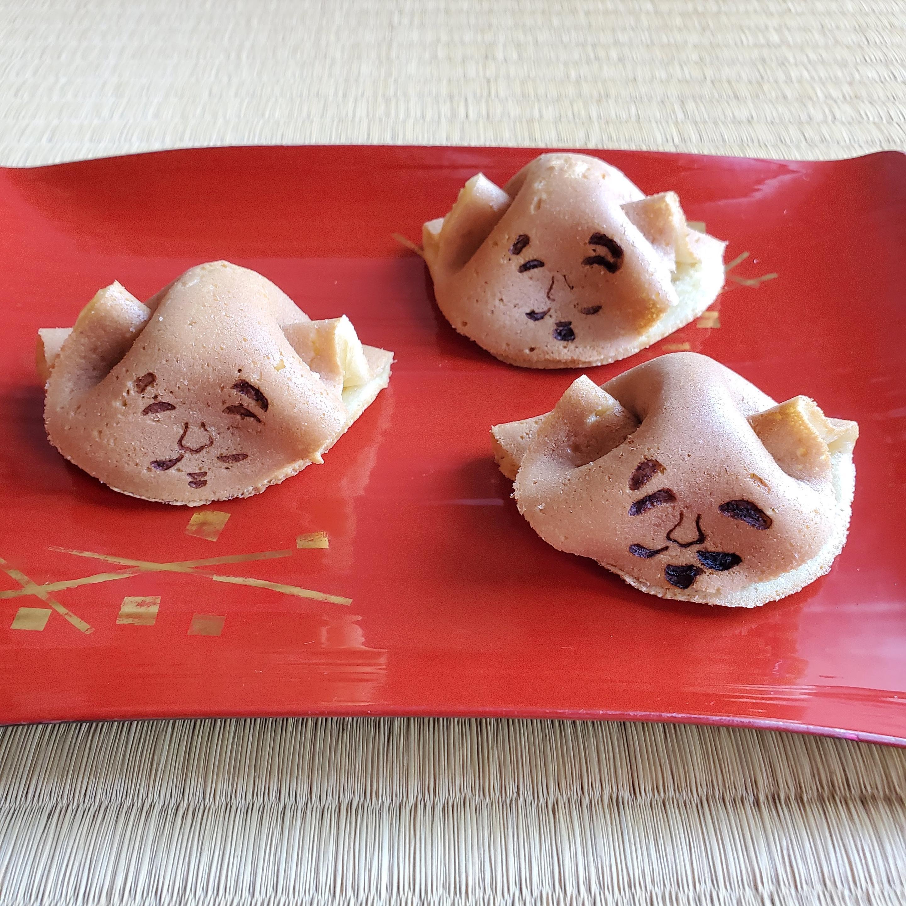 Pancake sweets modeled and branded to look like the head of Ebisu, for the harvest time celebrations at Ebisu-jinja.