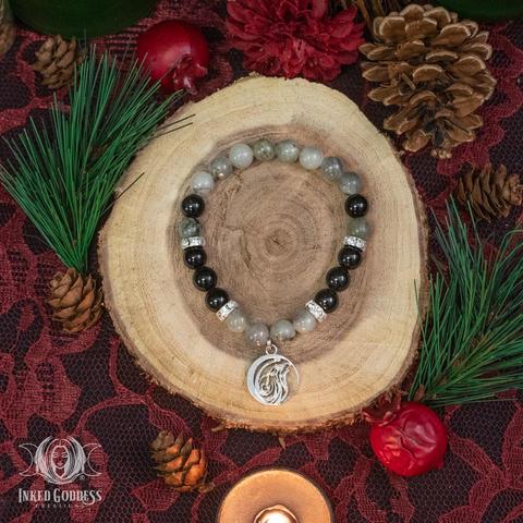 Photo of the exclusive "Labradorite & Tourmaline Wolf Bracelet" product by Inked Goddess Creations.