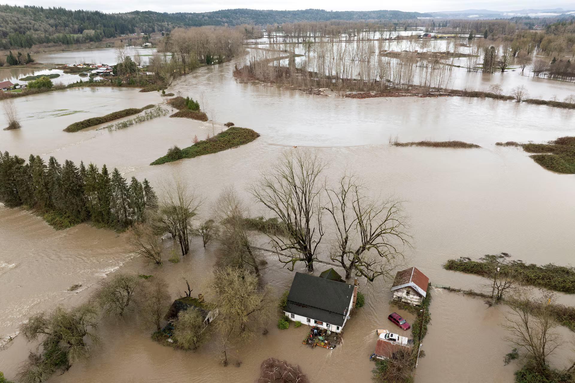 A drone view shows an area flooded by the Snoqualmie River.