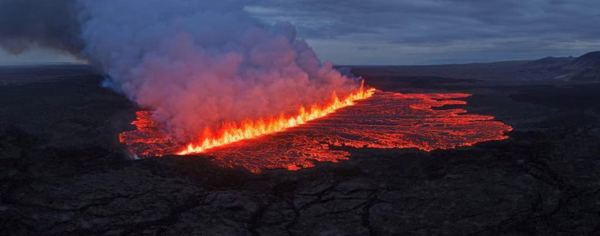 Lava emerges through a fissure following a volcano eruption.