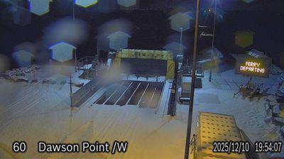Ferry cam looking west from the Wolfe Island Winter Ferry Dock on Wolfe Island with Lake Ontario in the distance. // Image captured at: 2025-12-11 00:55:34 UTC (about 5 min. prior to this post) // Current Temp in Wolfe Island: 32.34 F | .19 C // Precip: light snow // Wind: N at 13.802 mph | 22.21 kph // Humidity: 85%