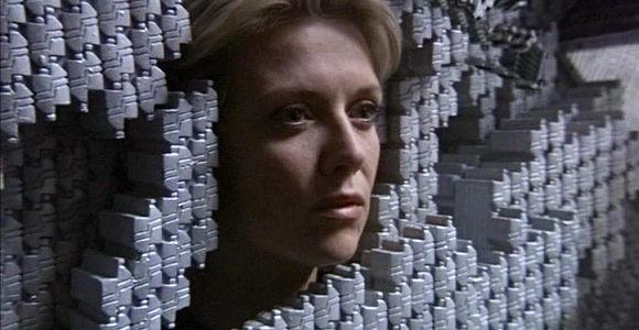Sam Carter surrounded by Replicator blocks