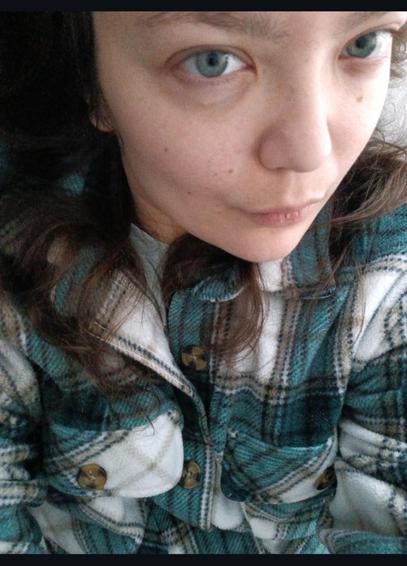 GoGhostly selfie on the sofa