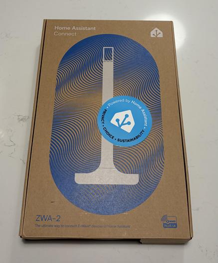 A photo of the box of the ZWA-2 and the sticker that comes with it. 