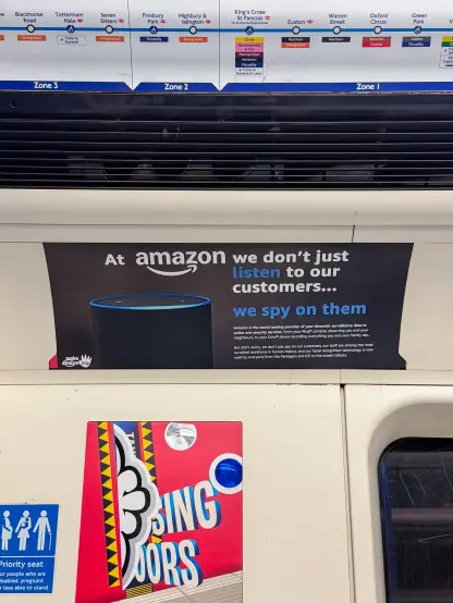 Brandalism ad on Amazon. "We don't just listen to our customers... we spy on them"