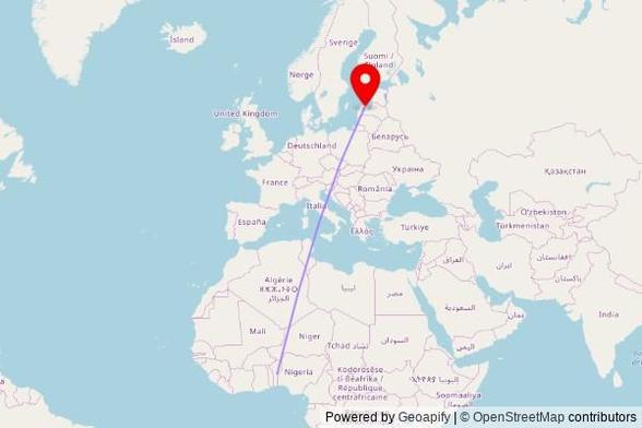 A map showing the great circle route from Tchaourou in Benin to a map pin at Dārtes Evanģēliski luteriskā baznīca, Vandzenes skola-Nogale-Lubezere, Vandzenes pagasts, LV-3281, Latvia